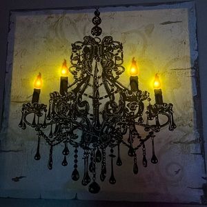 Vintage Light Chandelier wall decor. Lights turn on and off . Batteries included